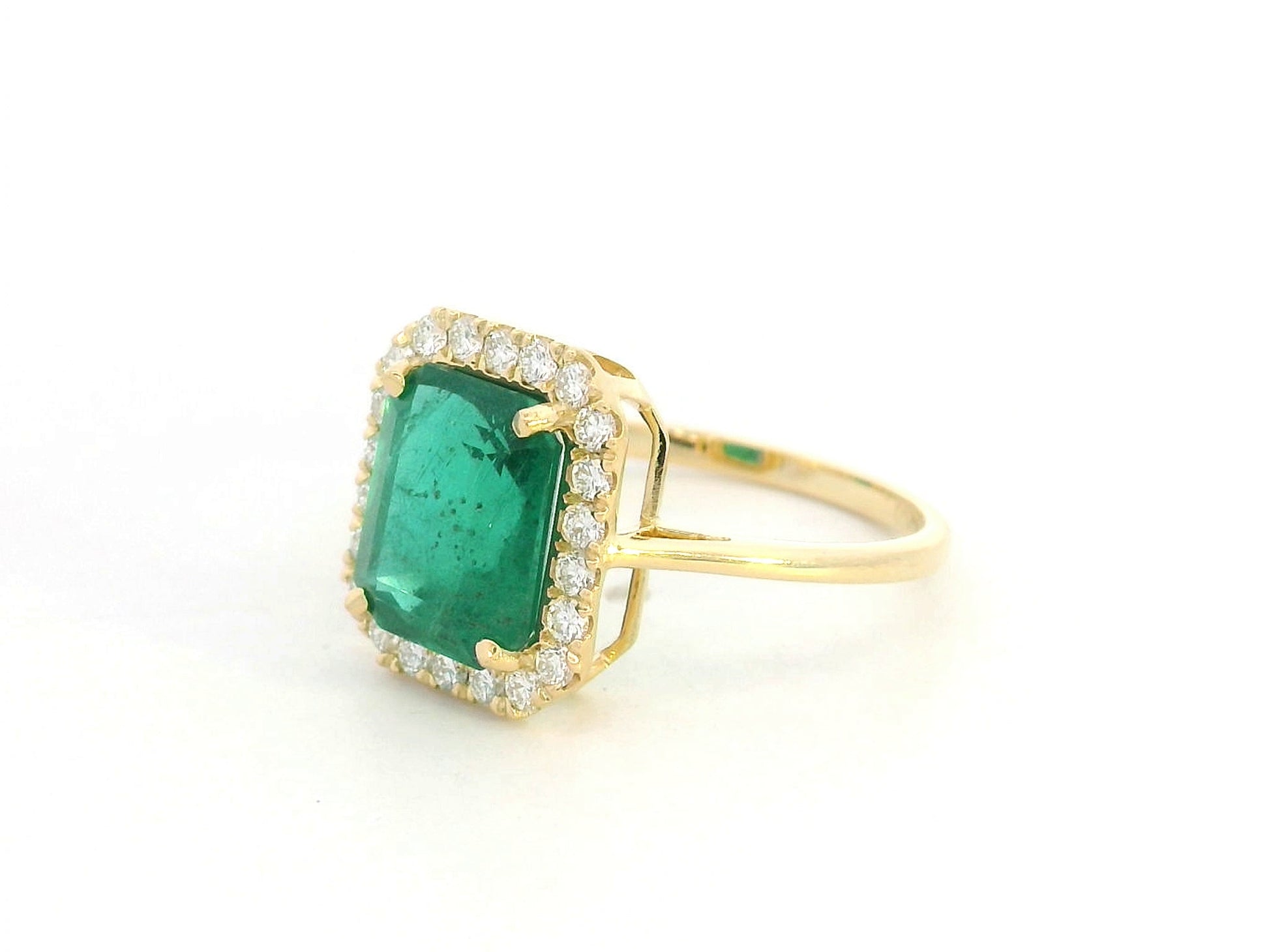 18K yellow gold emerald ring – 2.70ct emerald-cut emerald with 0.34ct diamond halo by Emirates Diamonds