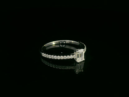 Emerald-cut diamond ring in 18K white gold with pavé band – 0.40ct D/VS1 GIA center stone by Emirates Diamonds.