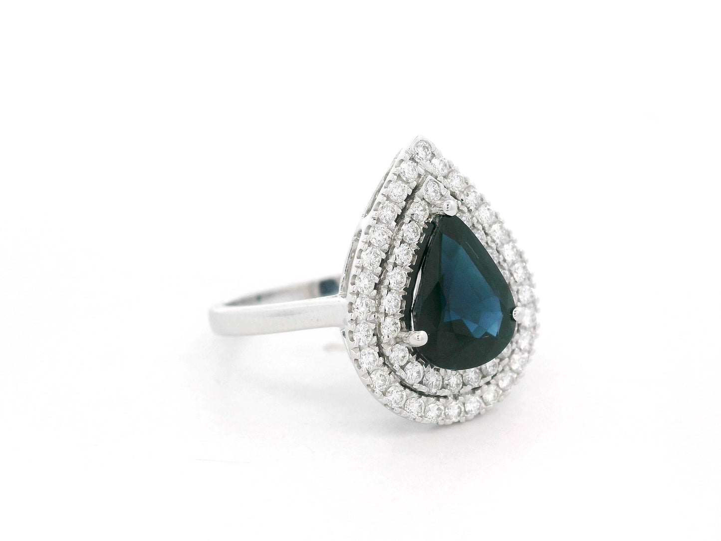 18K white gold pear-shaped blue sapphire ring – 2.31ct sapphire with 0.51ct double diamond halo by Emirates Diamonds