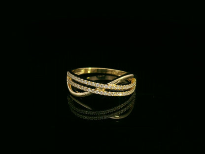 18K yellow gold overlapping diamond band with three pavé-set rows – Emirates Diamonds fine jewelry.