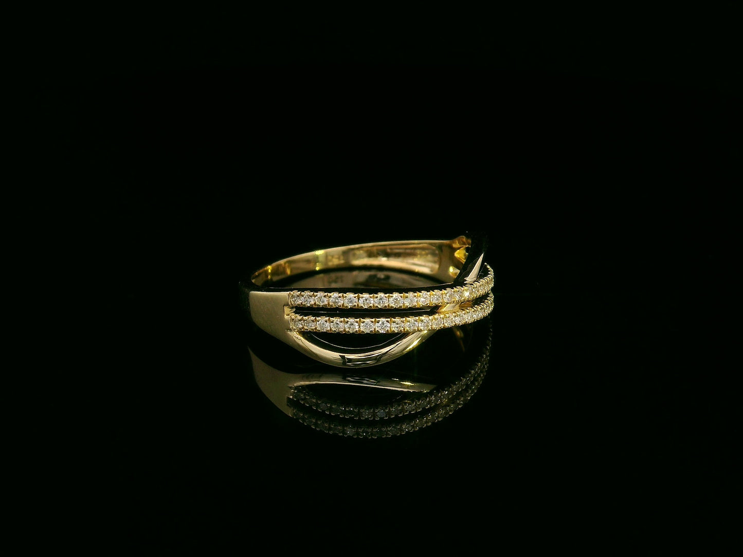 18K yellow gold overlapping diamond band with three pavé-set rows – Emirates Diamonds fine jewelry.