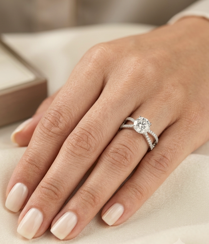 18K white gold engagement ring featuring a 2.01 carat GIA certified round brilliant diamond with D color and SI2 clarity in a four-prong setting with a diamond split shank band.