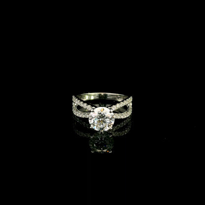 18K white gold engagement ring featuring a 2.01 carat GIA certified round brilliant diamond with D color and SI2 clarity in a four-prong setting with a diamond split shank band.