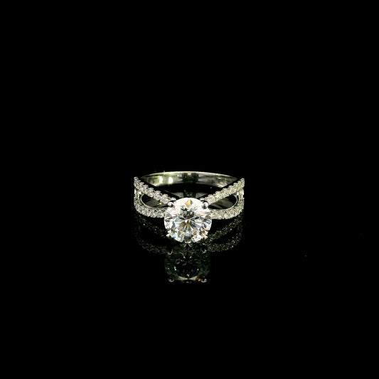 18K white gold engagement ring featuring a 2.01 carat GIA certified round brilliant diamond with D color and SI2 clarity in a four-prong setting with a diamond split shank band.