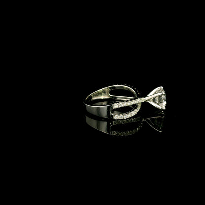 18K white gold engagement ring featuring a 2.01 carat GIA certified round brilliant diamond with D color and SI2 clarity in a four-prong setting with a diamond split shank band.