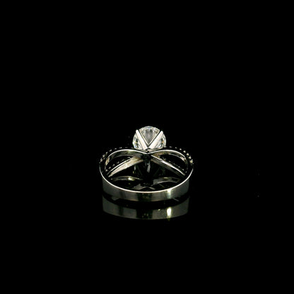 18K white gold engagement ring featuring a 2.01 carat GIA certified round brilliant diamond with D color and SI2 clarity in a four-prong setting with a diamond split shank band.