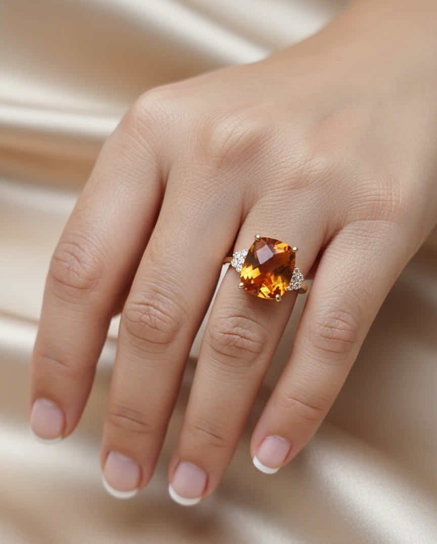 18K yellow gold cushion-cut citrine and diamond ring featuring a 4.37 carat citrine and 0.16 carat total diamond weight by Emirates Diamonds
