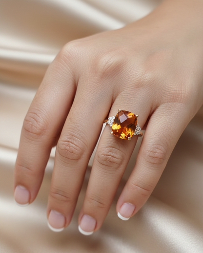 18K yellow gold cushion-cut citrine and diamond ring featuring a 4.37 carat citrine and 0.16 carat total diamond weight by Emirates Diamonds
