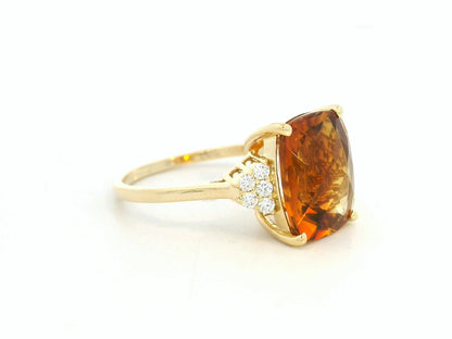 18K yellow gold cushion-cut citrine and diamond ring featuring a 4.37 carat citrine and 0.16 carat total diamond weight by Emirates Diamonds