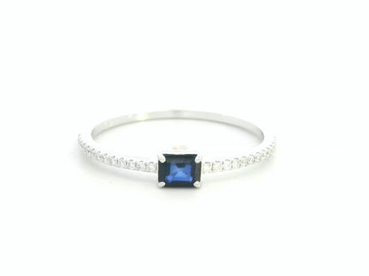 18K white gold blue sapphire solitaire ring with pavé diamond band, 0.25 carat sapphire and 0.08 carat total diamond weight by Emirates Diamonds