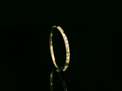 18K yellow gold diamond band ring with 0.16 carat diamonds – Emirates Diamonds