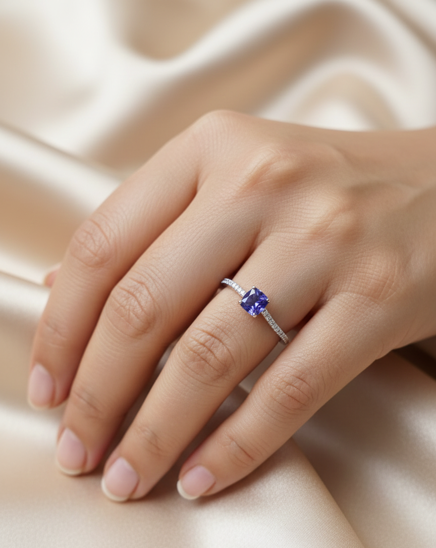 18K white gold cushion-cut tanzanite ring with diamond pavé band – Emirates Diamonds