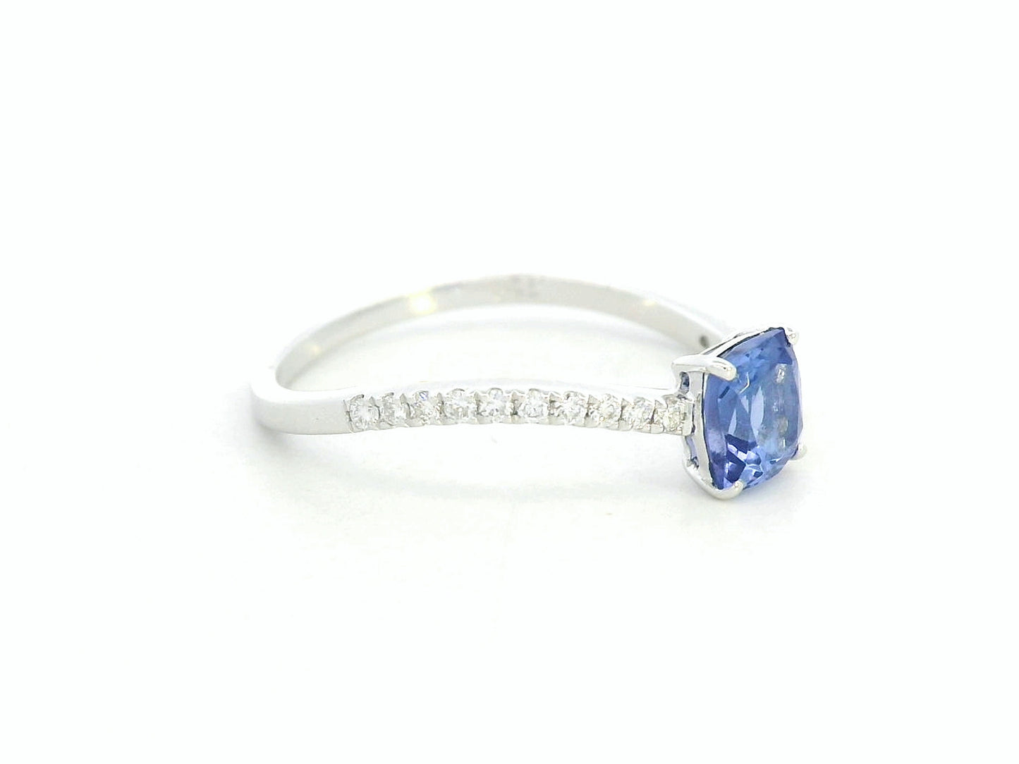 18K white gold cushion-cut tanzanite ring with diamond pavé band – Emirates Diamonds