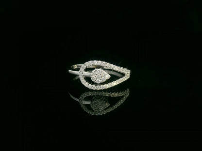 18K white gold diamond bypass ring featuring a teardrop-shaped diamond cluster and pavé set band by Emirates Diamonds
