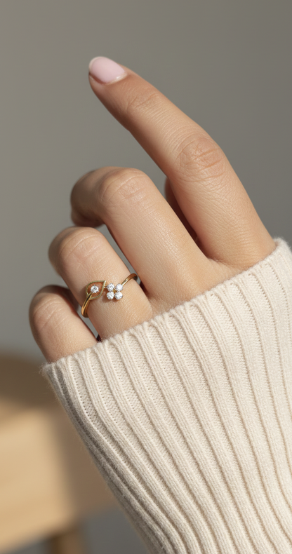 18K yellow gold diamond bypass ring with floral cluster design, 0.16 carat diamonds, modern fine jewelry by Emirates Diamonds