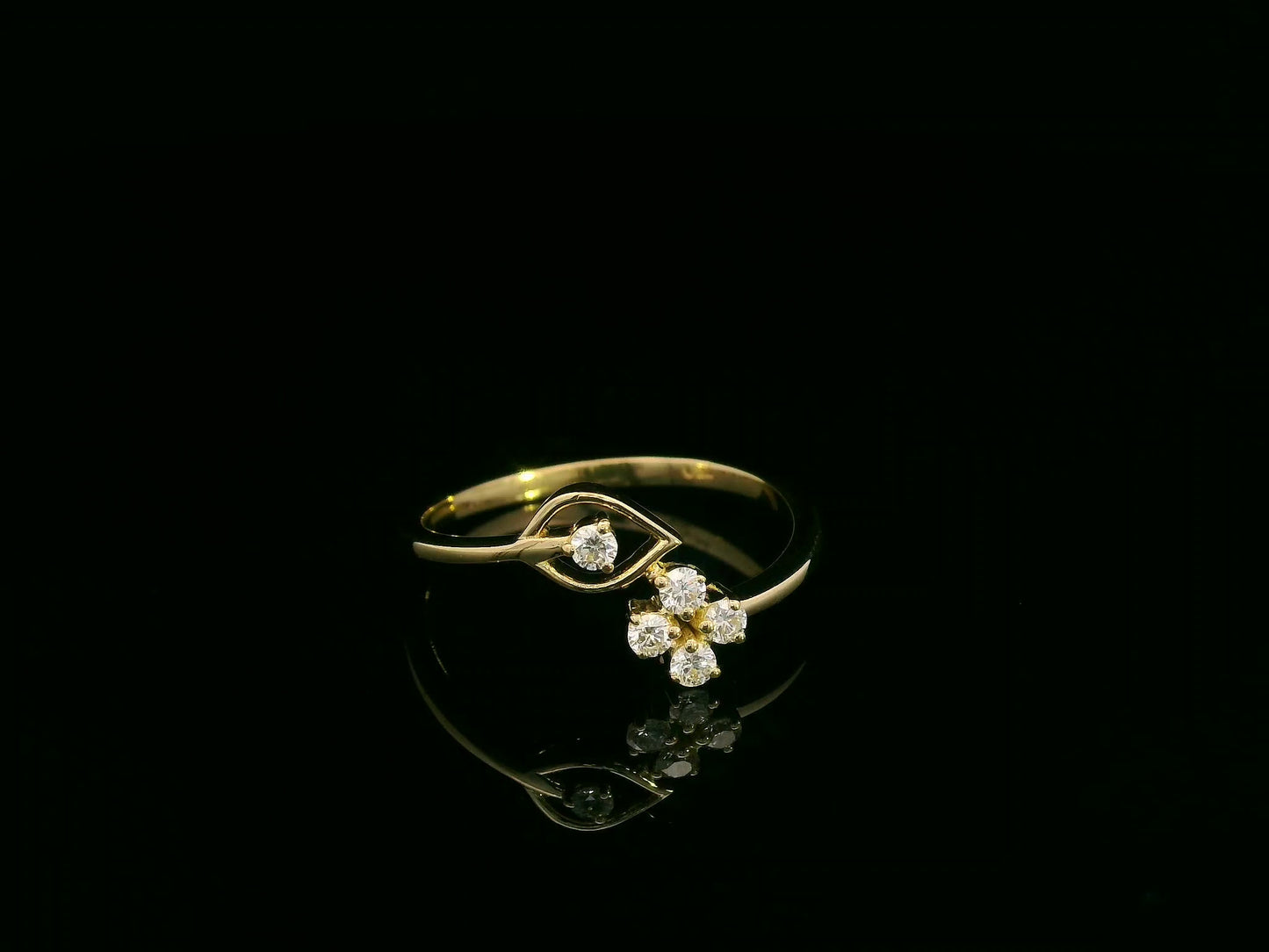 18K yellow gold diamond bypass ring with floral cluster design, 0.16 carat diamonds, modern fine jewelry by Emirates Diamonds