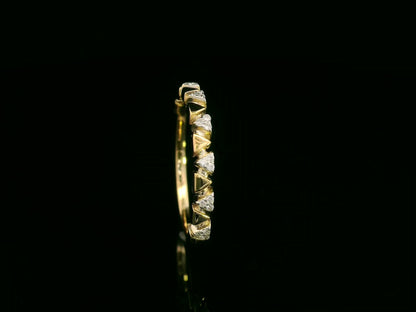 18K yellow gold diamond geometric band ring with triangle accents, 0.08 carat diamonds, modern stackable ring by Emirates Diamonds