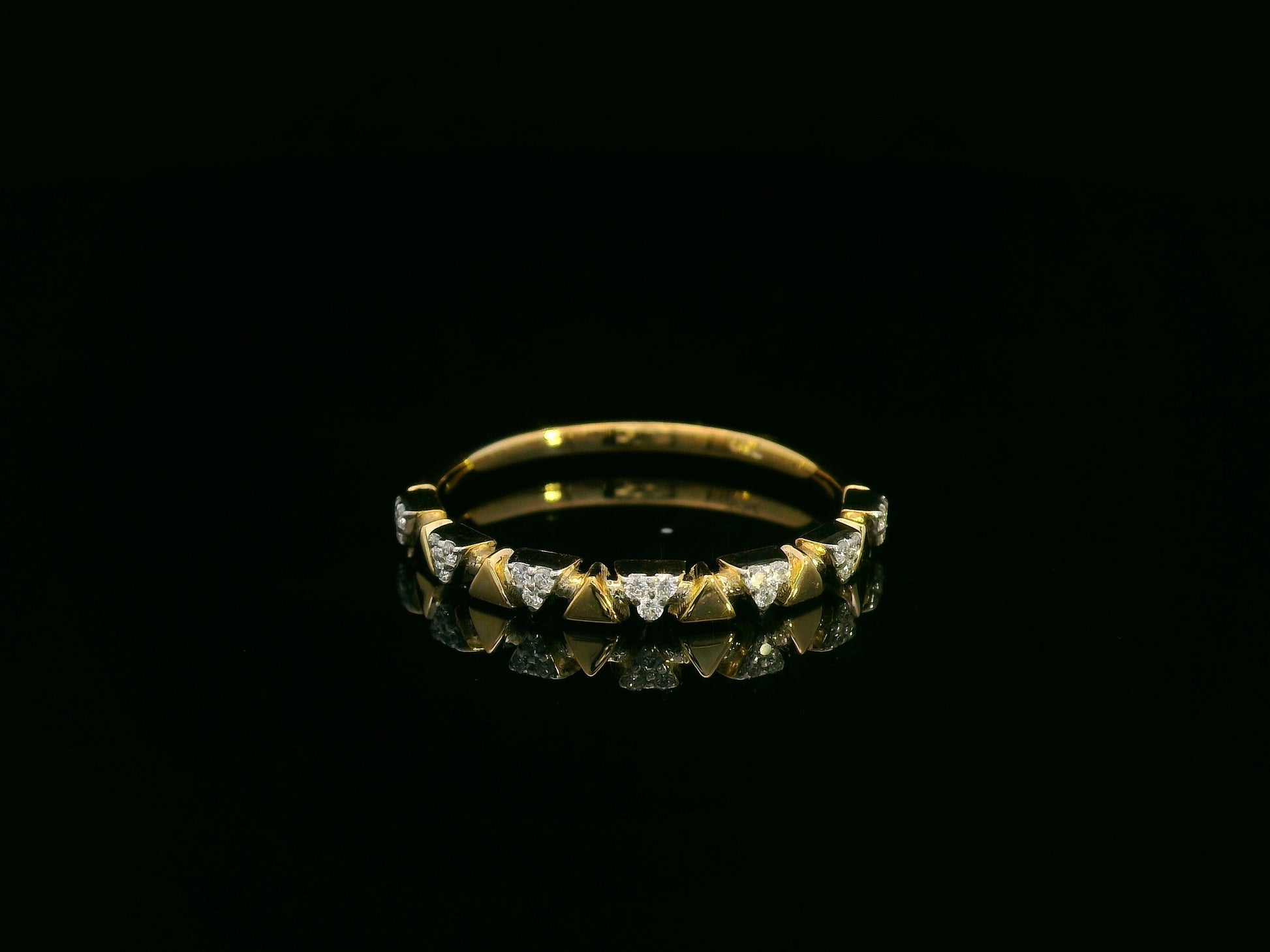 18K yellow gold diamond geometric band ring with triangle accents, 0.08 carat diamonds, modern stackable ring by Emirates Diamonds