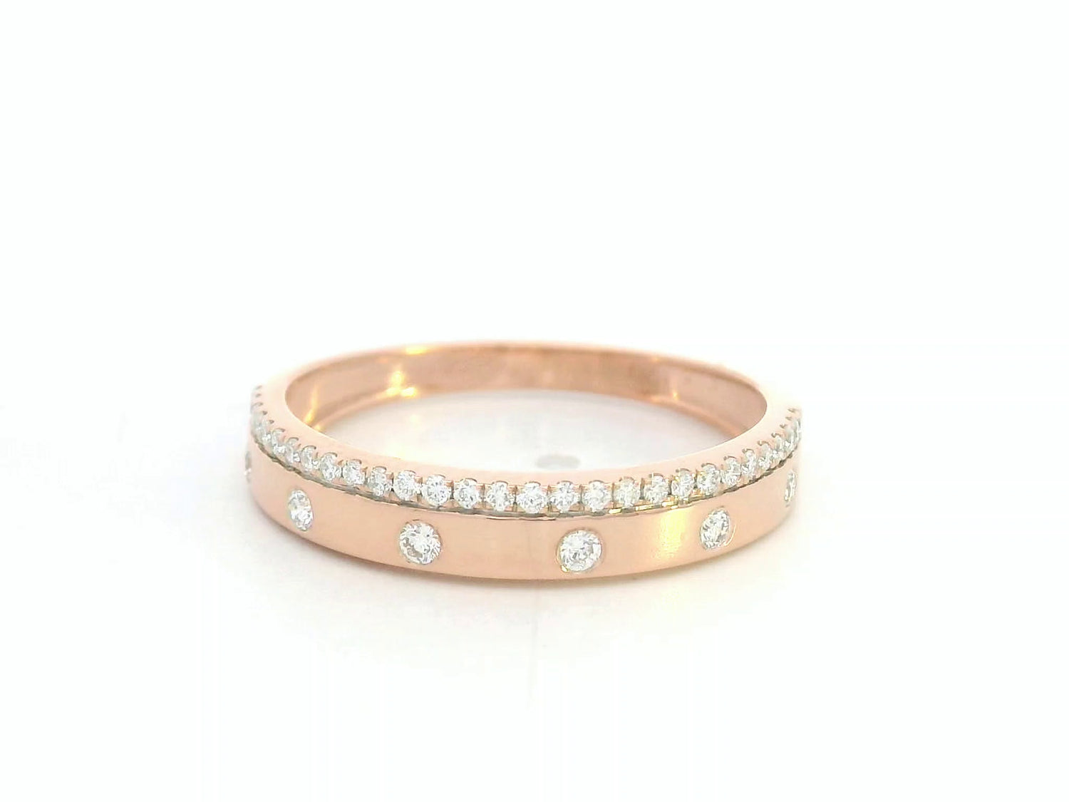 18K rose gold diamond band ring with pavé and flush-set natural diamonds by Emirates Diamonds