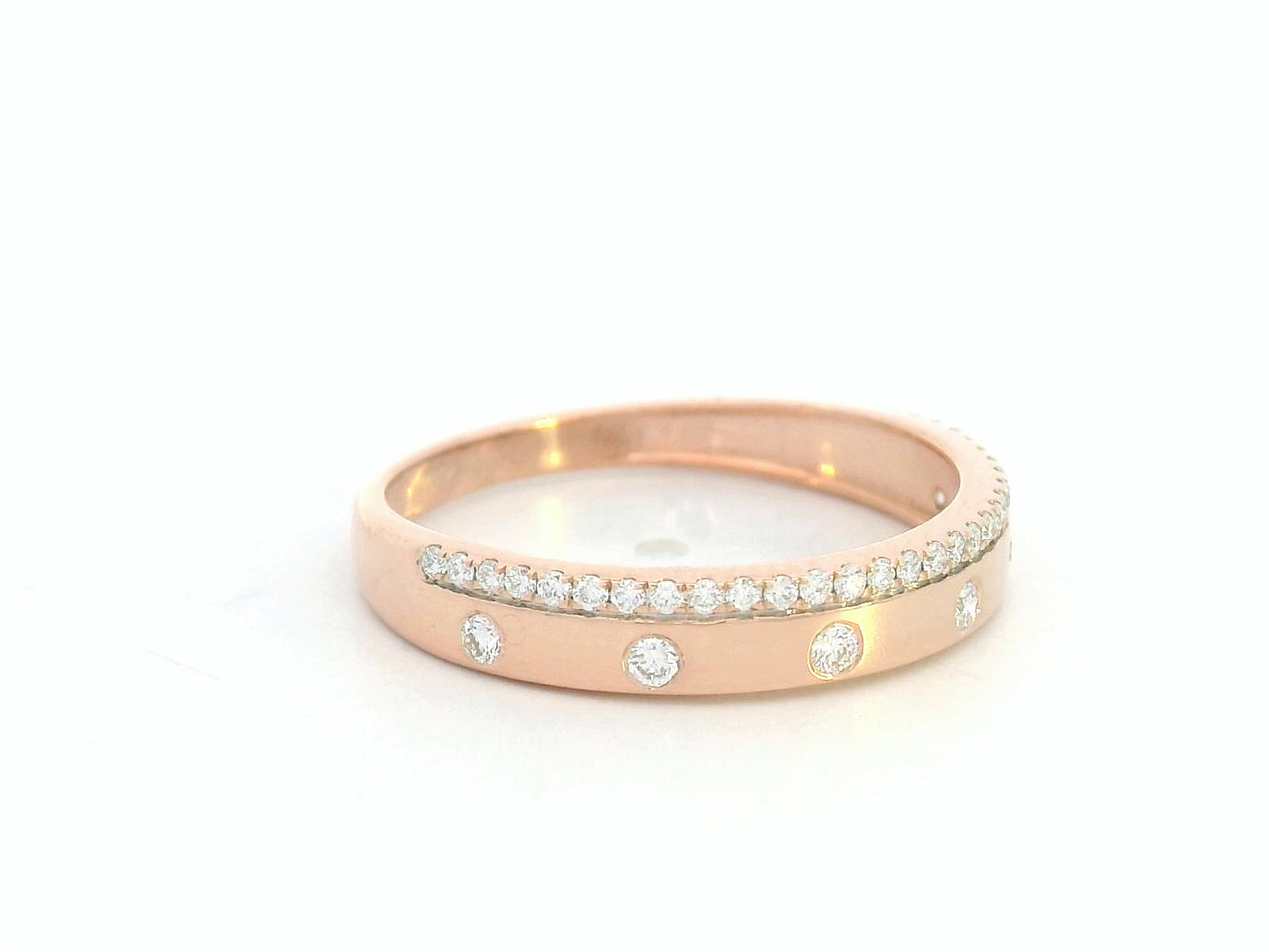 18K rose gold diamond band ring with pavé and flush-set natural diamonds by Emirates Diamonds