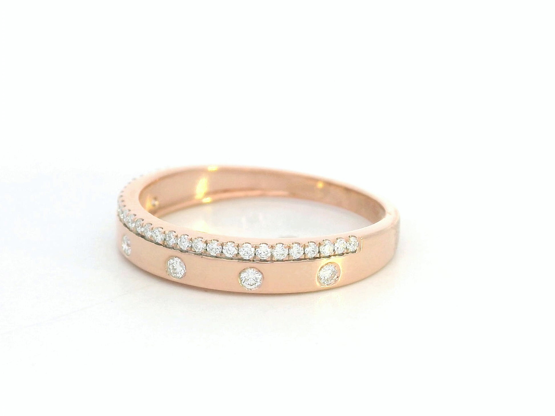 18K rose gold diamond band ring with pavé and flush-set natural diamonds by Emirates Diamonds