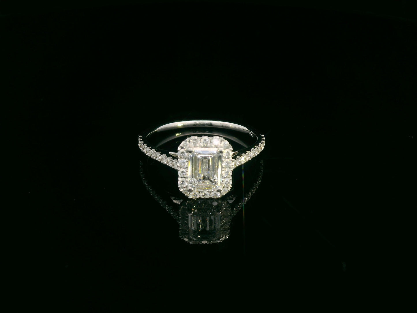 18K white gold emerald cut diamond bridal ring set with GIA certified 1.00 carat center diamond by Emirates Diamonds