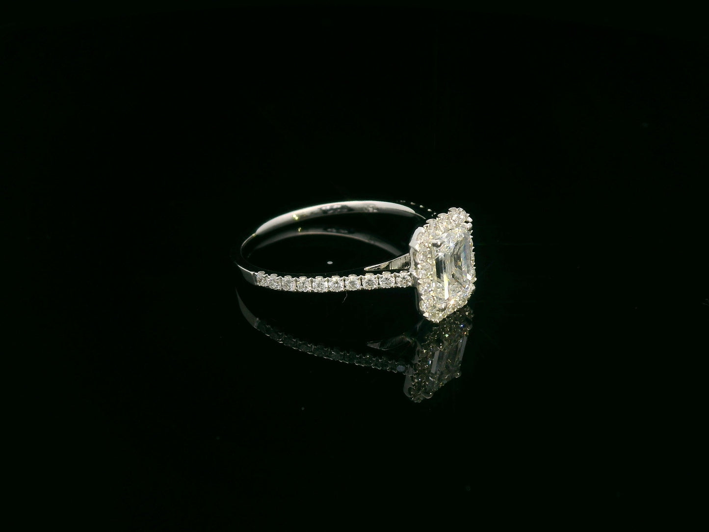18K white gold emerald cut diamond bridal ring set with GIA certified 1.00 carat center diamond by Emirates Diamonds