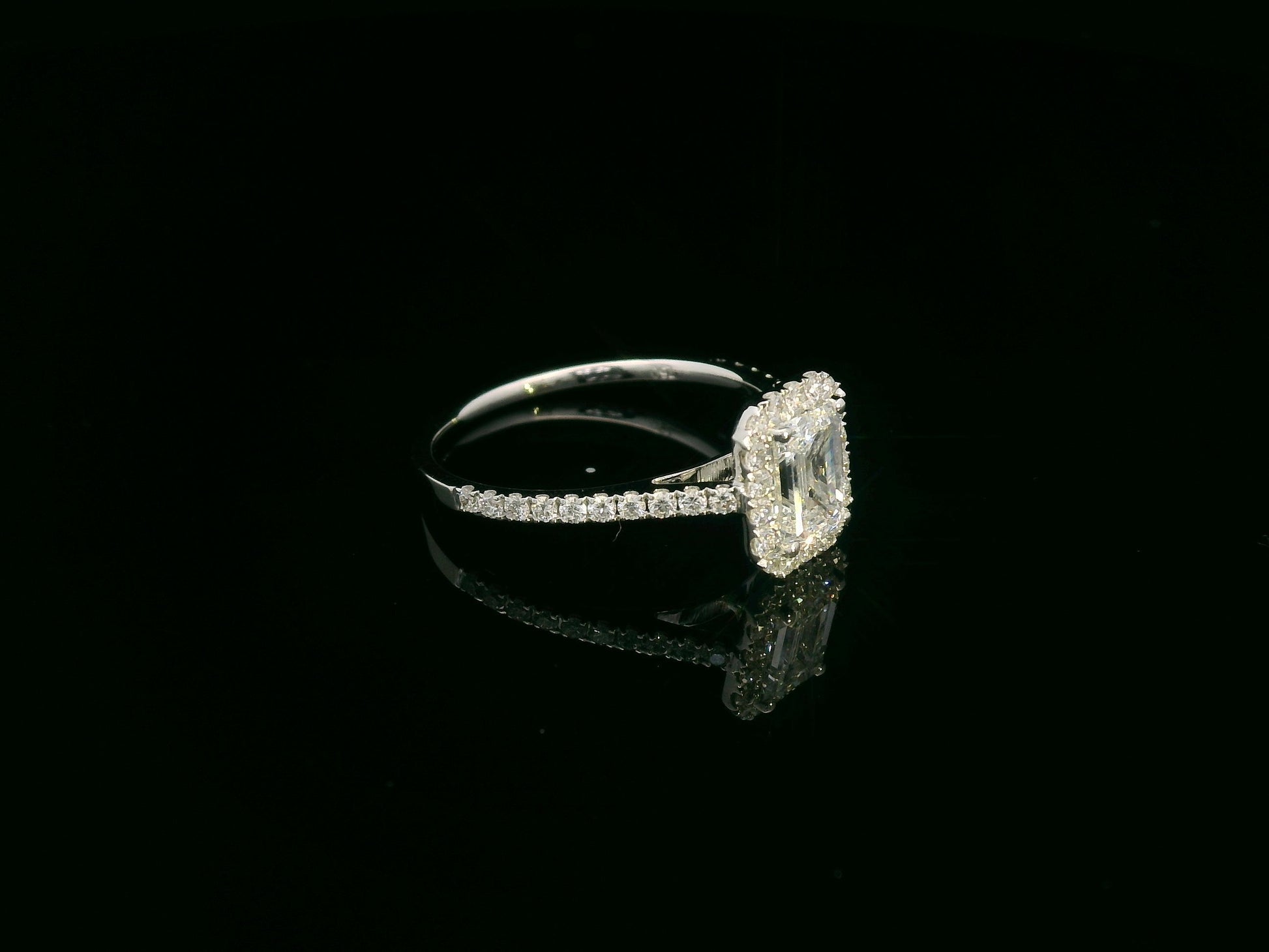 18K white gold emerald cut diamond bridal ring set with GIA certified 1.00 carat center diamond by Emirates Diamonds