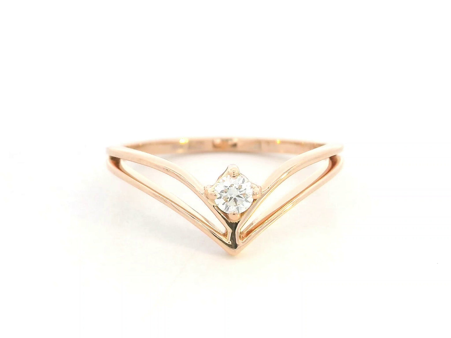 18K yellow gold V-shaped diamond ring with minimalist chevron design by Emirates Diamonds