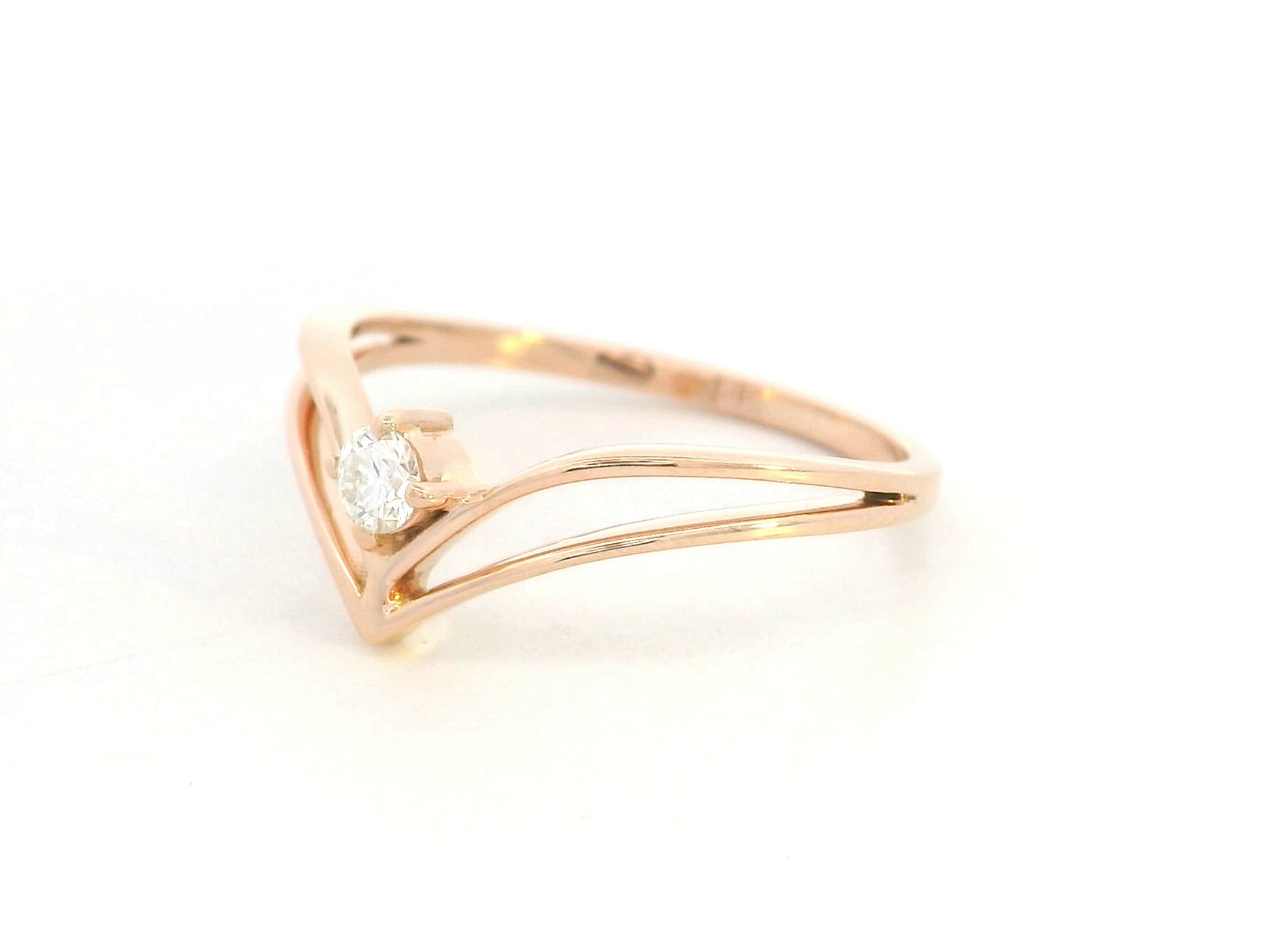 18K yellow gold V-shaped diamond ring with minimalist chevron design by Emirates Diamonds