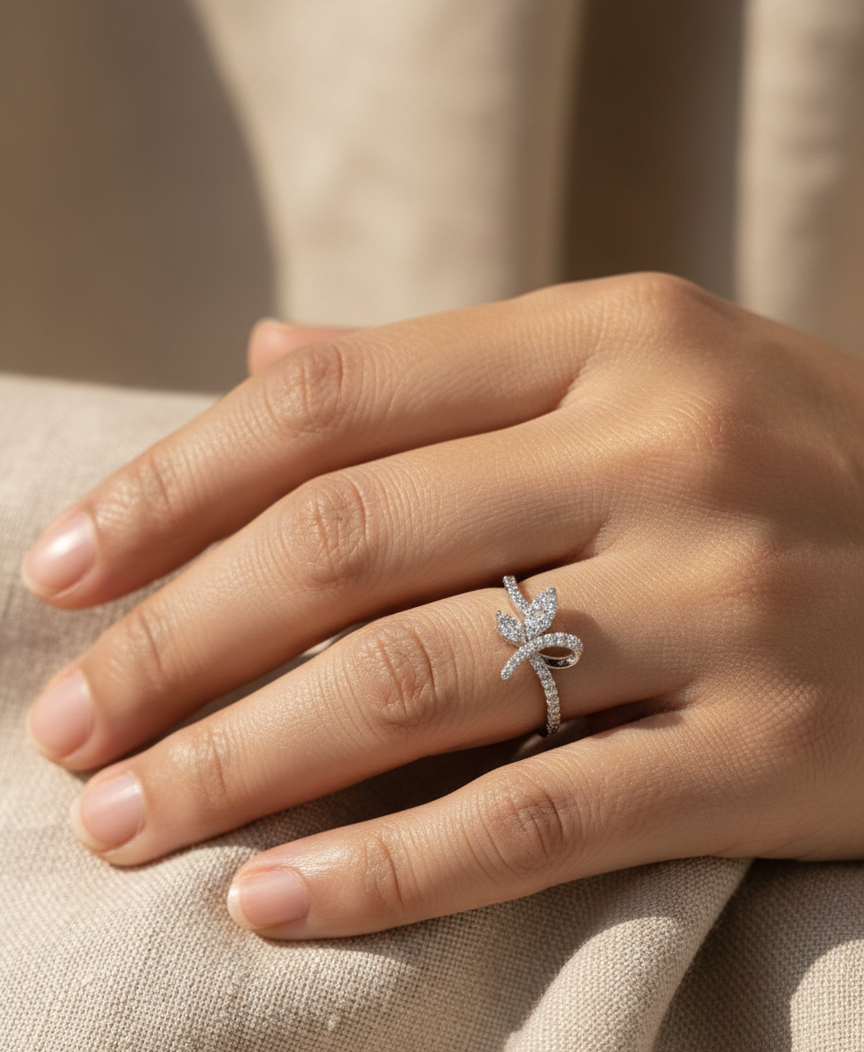 18K white gold diamond leaf crossover ring by Emirates Diamonds