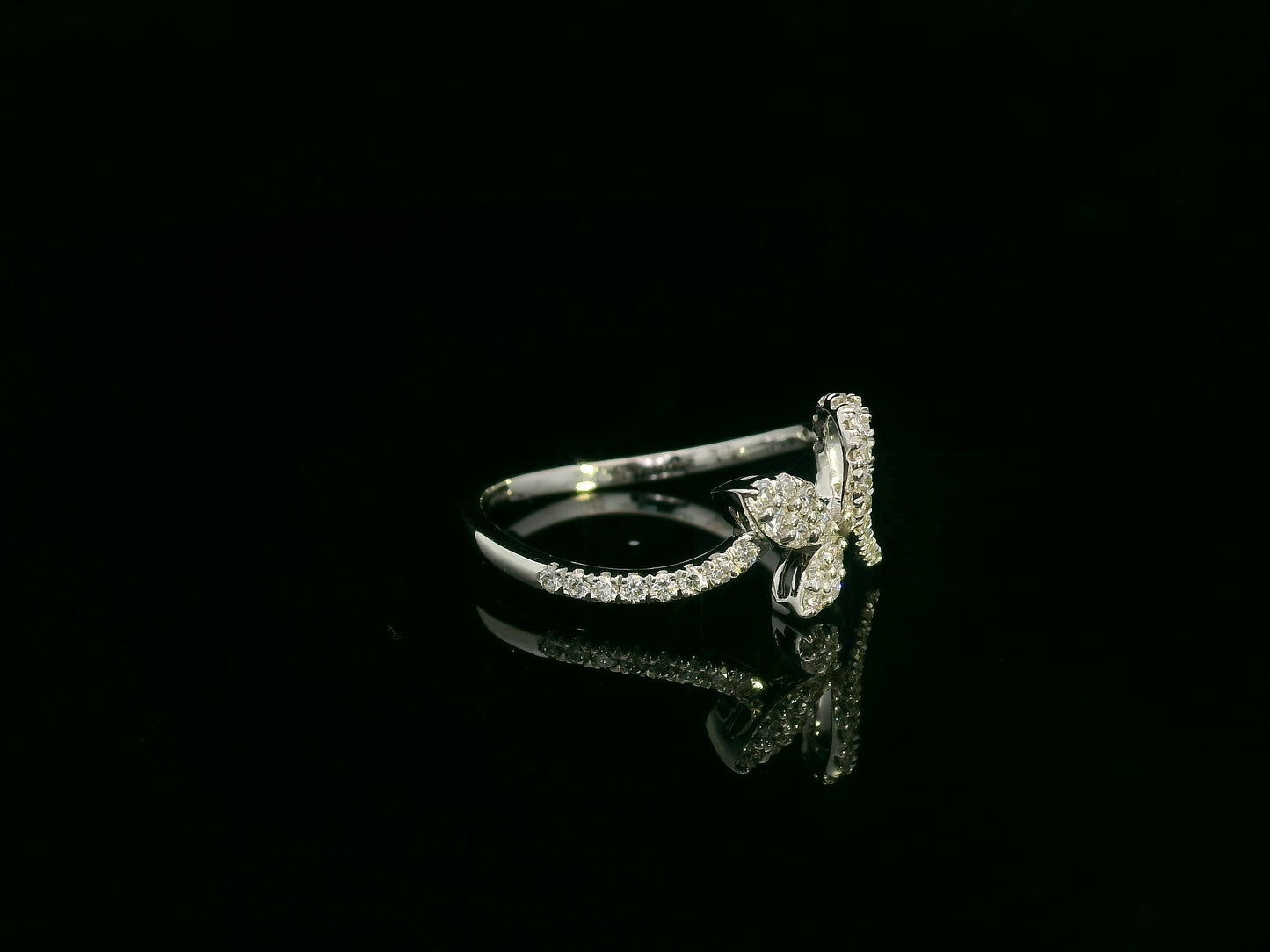 18K white gold diamond leaf crossover ring by Emirates Diamonds