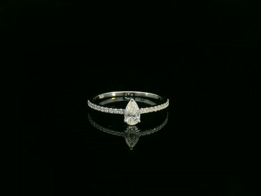 18K white gold pear-shaped diamond ring with pavé band by Emirates Diamonds