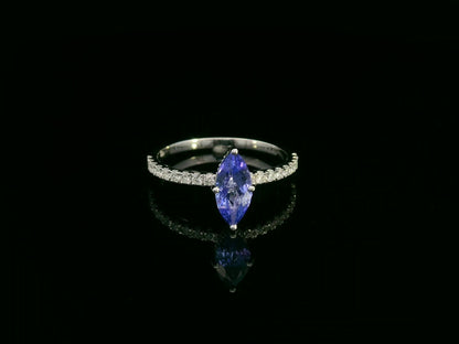 18K white gold marquise-cut tanzanite ring with diamond halo and pavé band by Emirates Diamonds