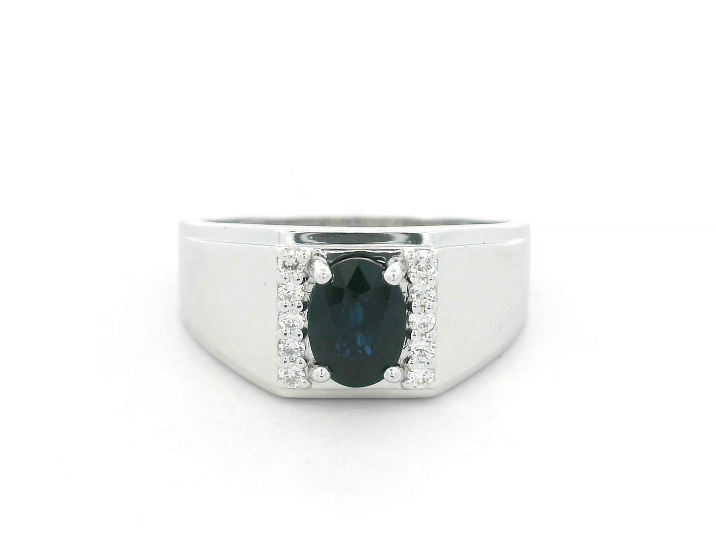 18K white gold men’s ring with 1.20 carat blue sapphire and diamond accents by Emirates Diamonds