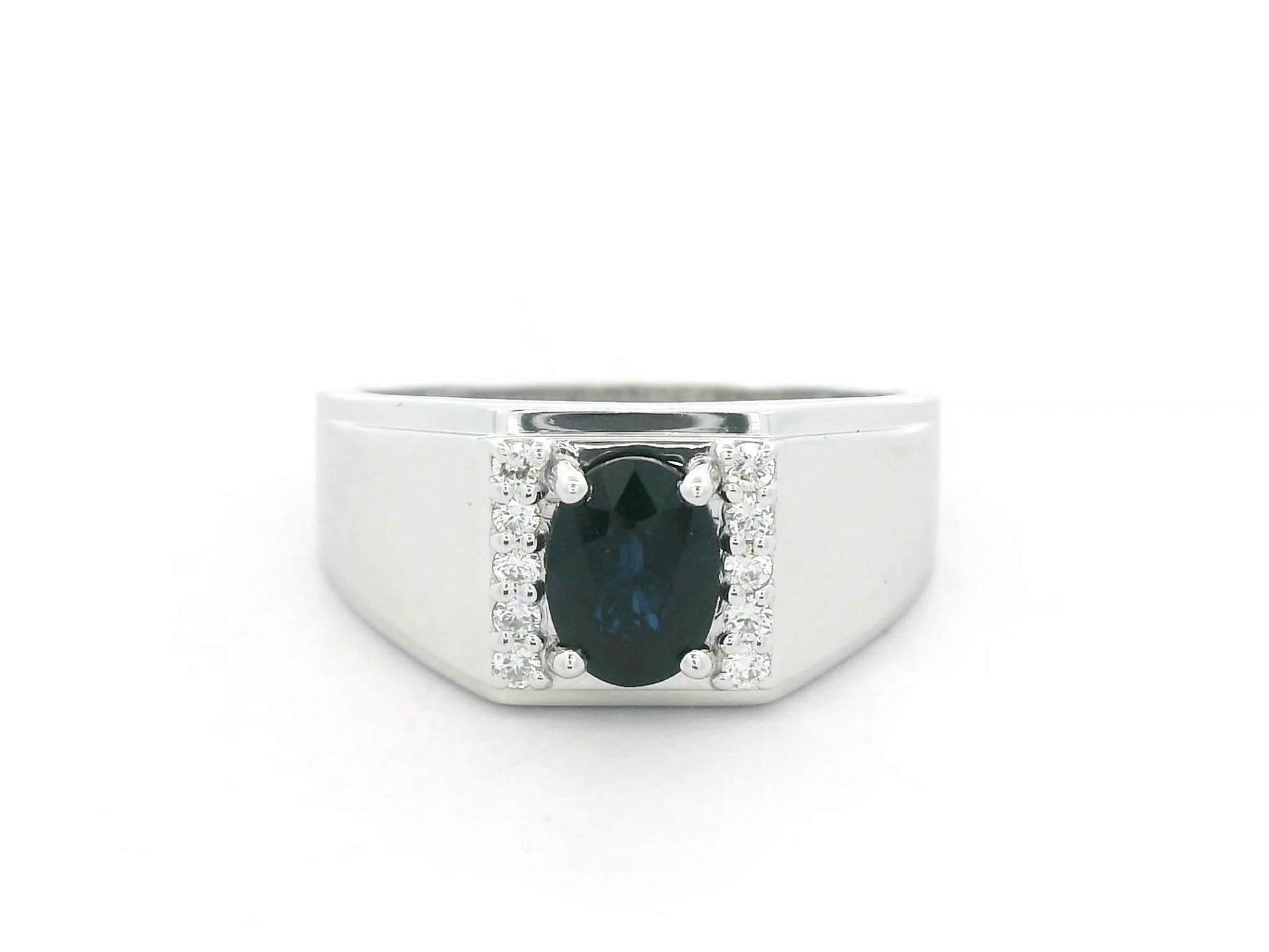 18K white gold men’s ring with 1.20 carat blue sapphire and diamond accents by Emirates Diamonds