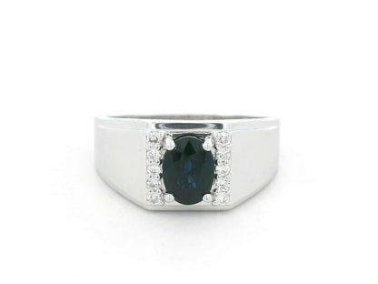 18K white gold men’s ring with 1.20 carat blue sapphire and diamond accents by Emirates Diamonds