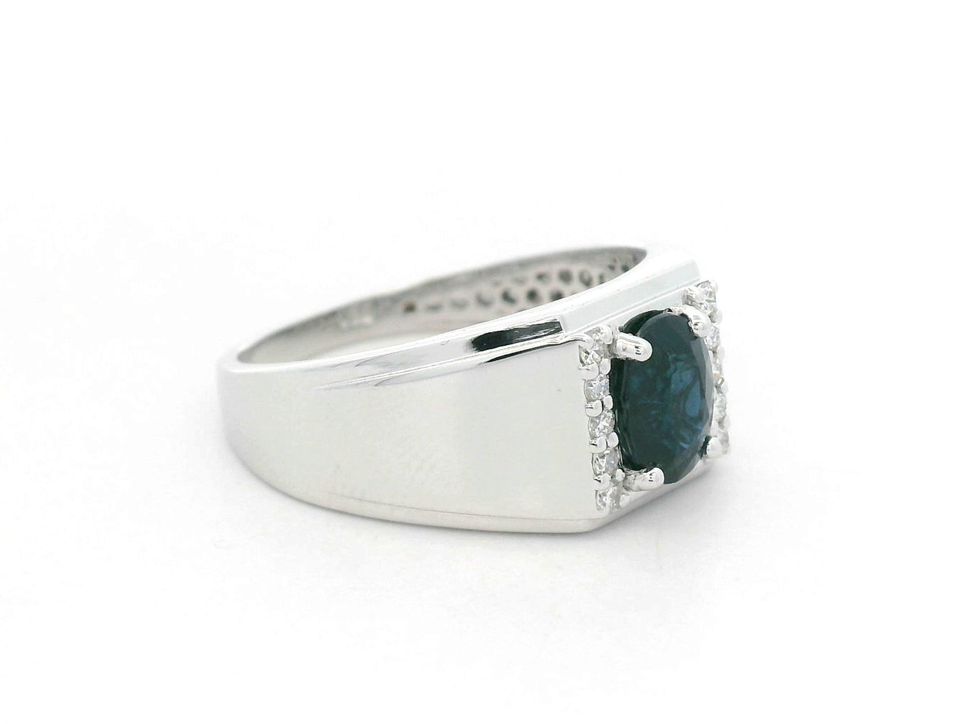 18K white gold men’s ring with 1.20 carat blue sapphire and diamond accents by Emirates Diamonds