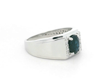 18K white gold men’s ring with 1.20 carat blue sapphire and diamond accents by Emirates Diamonds