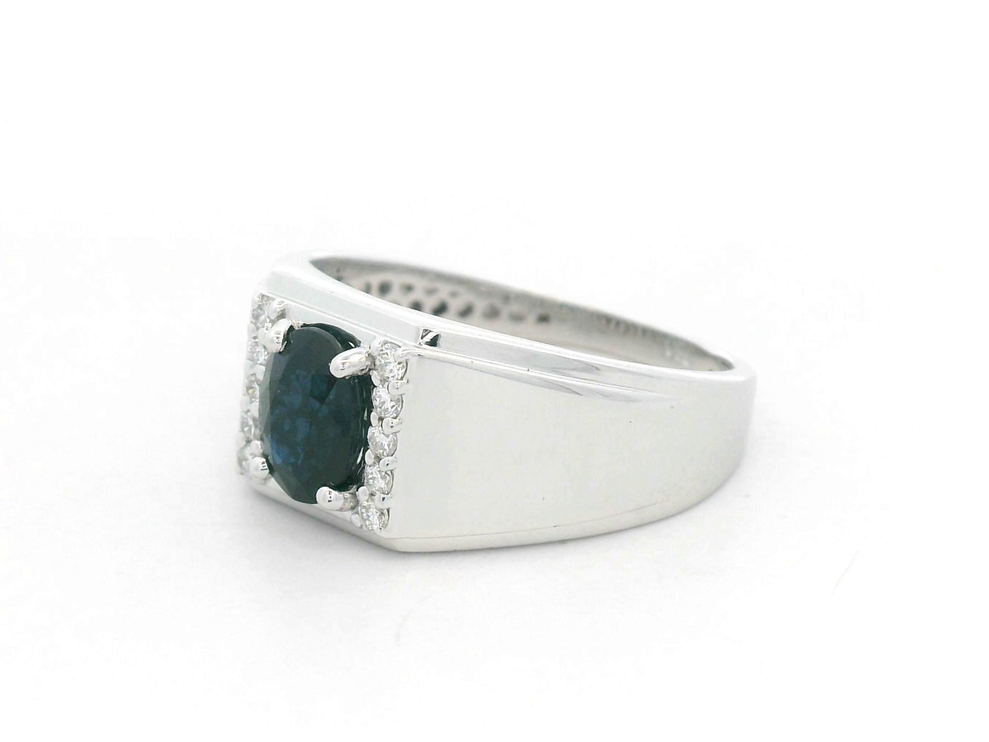 18K white gold men’s ring with 1.20 carat blue sapphire and diamond accents by Emirates Diamonds