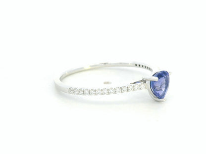 Pear-cut tanzanite ring in 18K white gold with pavé diamond band by Emirates Diamonds