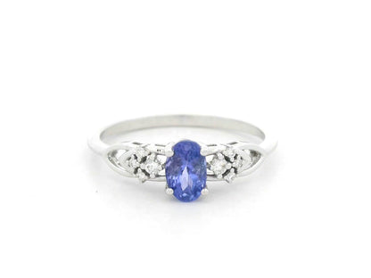 Oval tanzanite and diamond ring in 18K white gold with delicate side diamonds by Emirates Diamonds