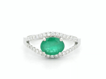 18K white gold emerald bypass ring with 0.98 carat emerald and 0.26 carat diamond accents by Emirates Diamonds