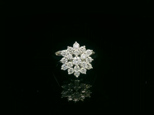 18K white gold diamond cluster ring with round brilliant diamonds in a floral-inspired setting by Emirates Diamonds