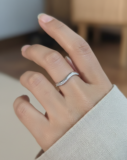 18K white gold curved diamond stacking band with pavé-set diamonds by Emirates Diamonds