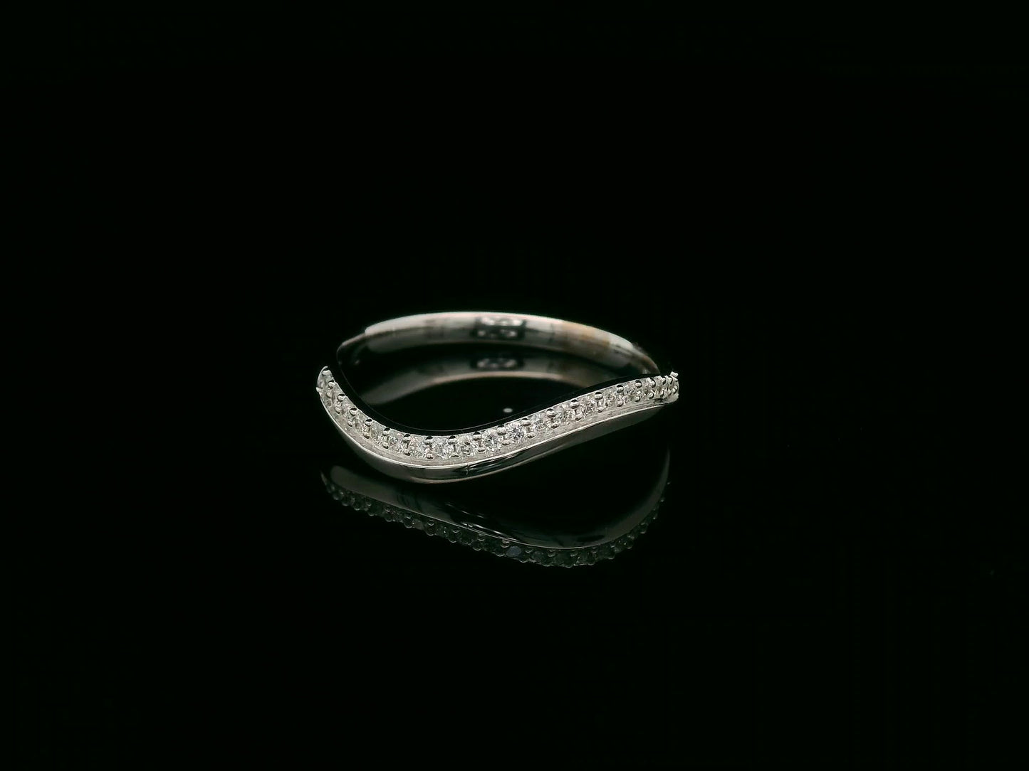18K white gold curved diamond stacking band with pavé-set diamonds by Emirates Diamonds