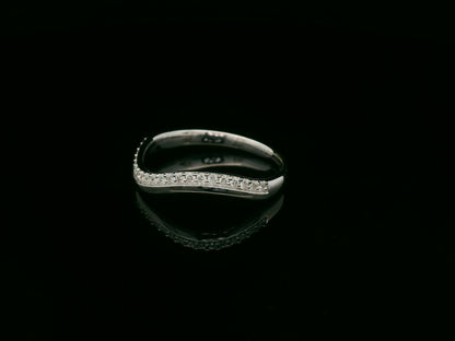 18K white gold curved diamond stacking band with pavé-set diamonds by Emirates Diamonds