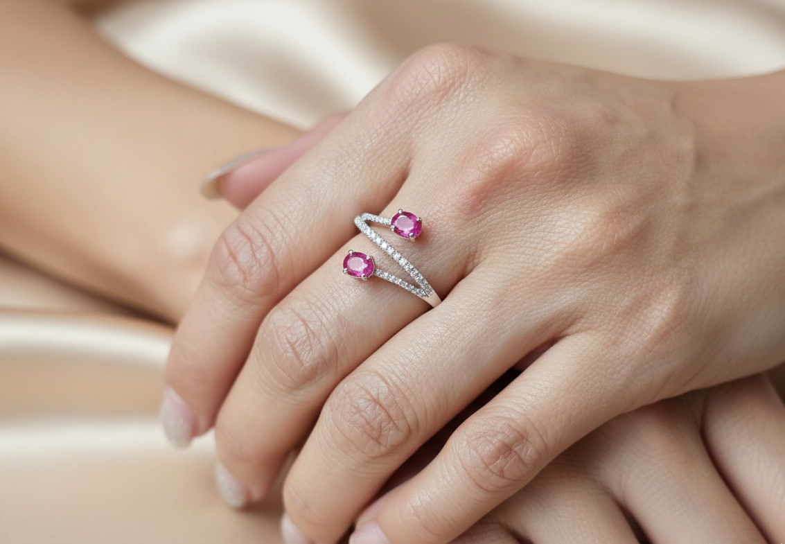 18K white gold ruby and diamond bypass ring with twin oval rubies by Emirates Diamonds