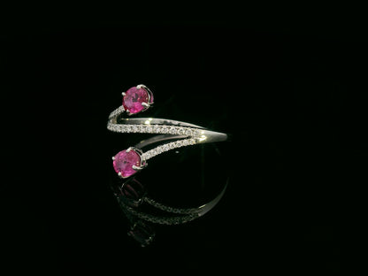 18K white gold ruby and diamond bypass ring with twin oval rubies by Emirates Diamonds