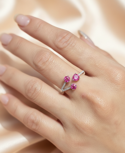 18K white gold open wrap ring with rubies and diamond accents by Emirates Diamonds